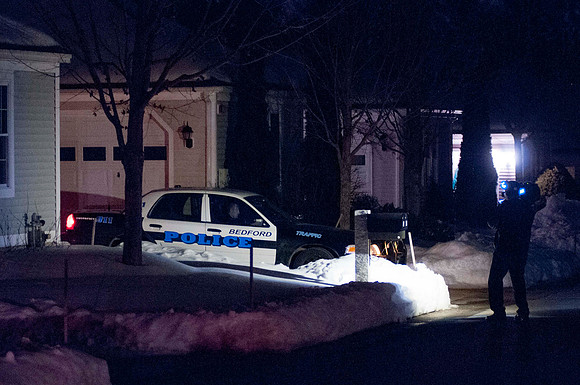 Bedford Police Officer secures scene at 49 Kennsington Lane Bedford