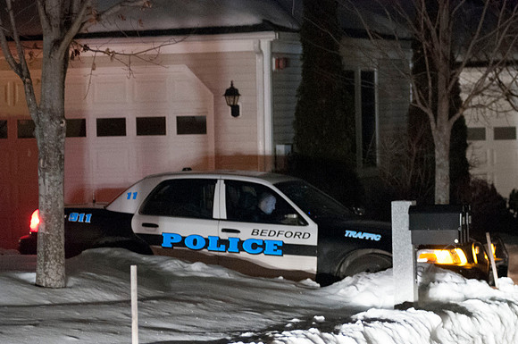 Bedford Police Officer secures scene at 49 Kennsington Lane Bedford