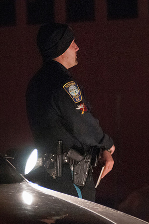 Bedford Police Officer secures scene at 49 Kennsington Lane Bedford